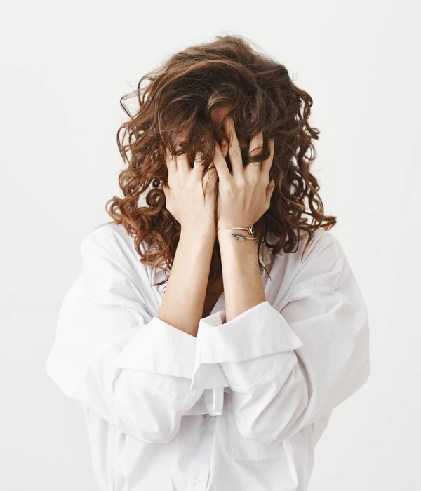 troubled-distressed-woman-press-hands-palms-page