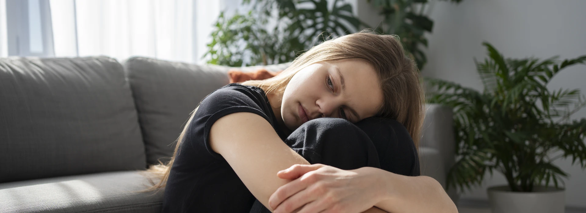 sad-young-woman-home-banner