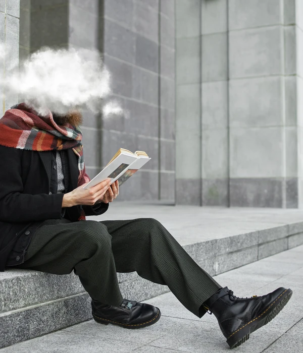 full-shot-woman-reading-outdoors-page